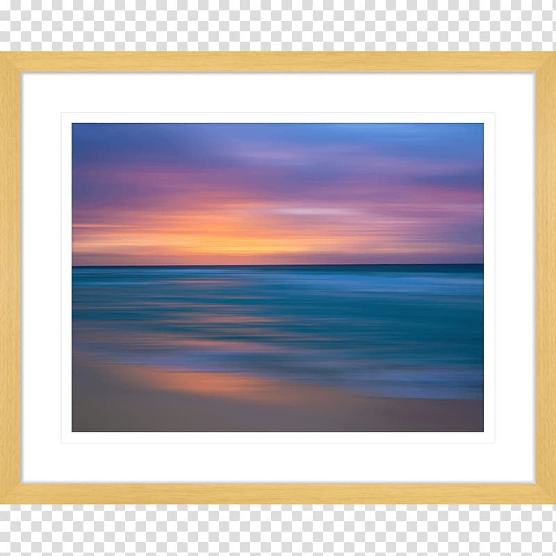 Framed long-exposure seascape at sunset with vibrant purple, orange, and blue hues over calm water.
