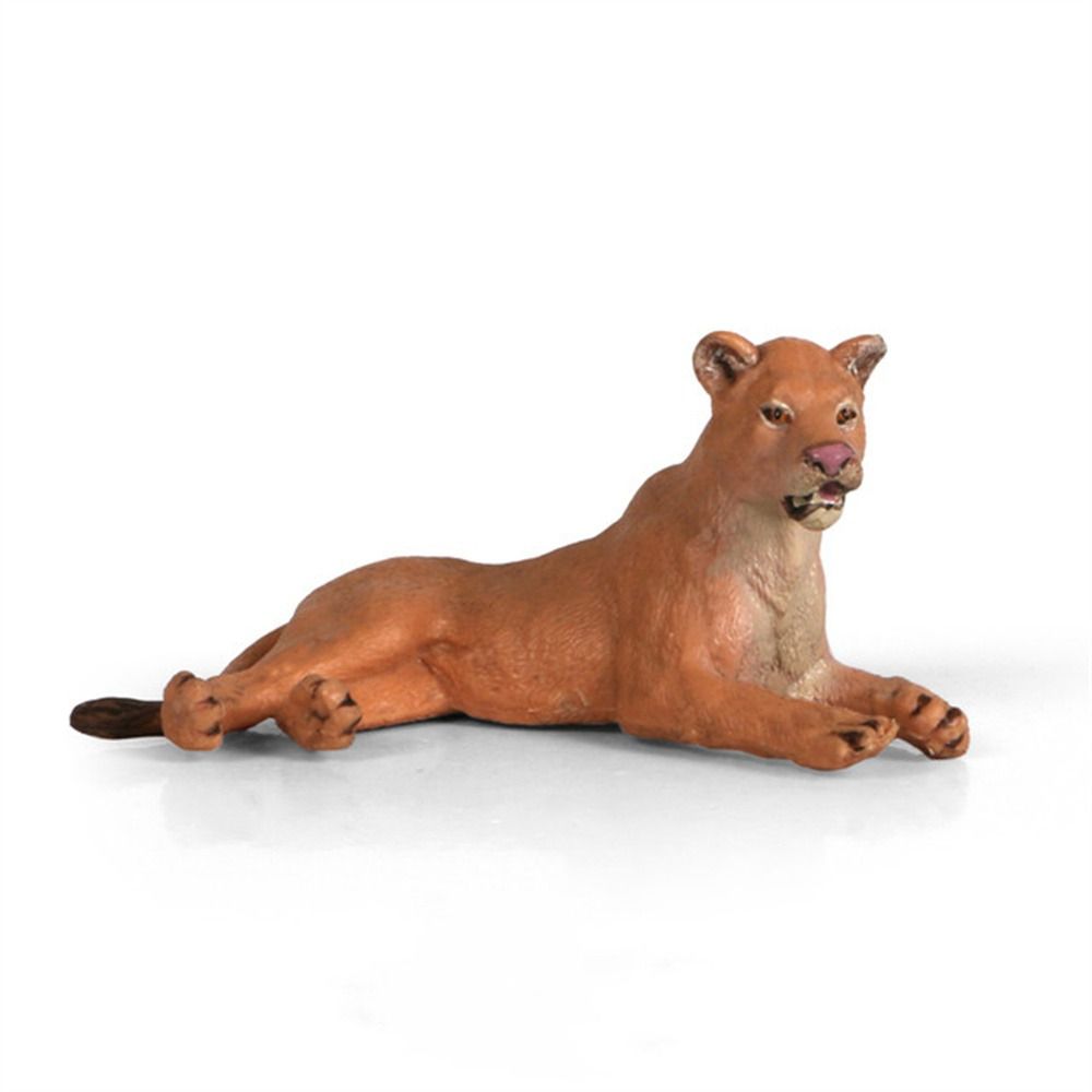 Realistic plastic figurine of a lying female lioness with detailed fur, open mouth, and alert expression on white background.