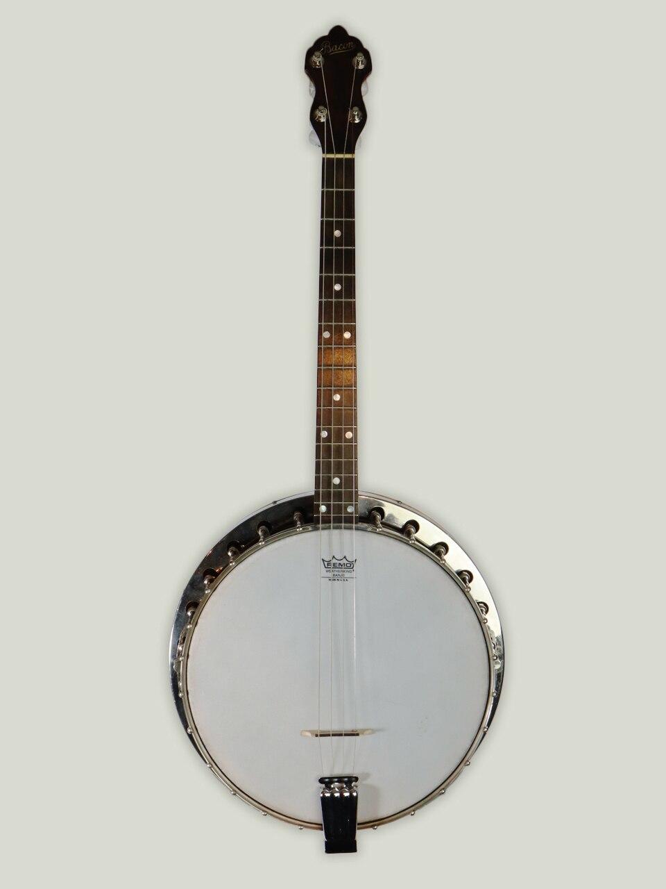 Vintage Bacon 5-string banjo with maple fretboard, Remo head, and chrome hardware on light background.