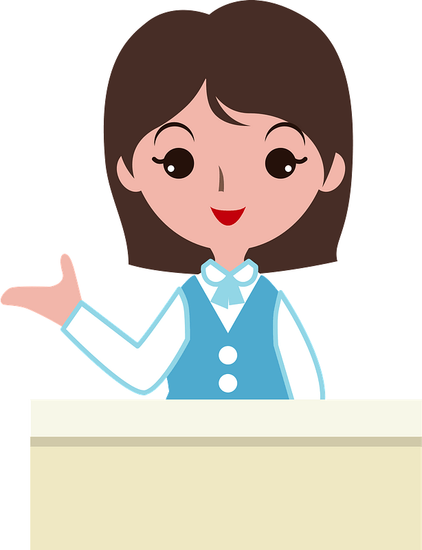 Friendly female teacher gesturing at a podium, wearing blue vest and white blouse.