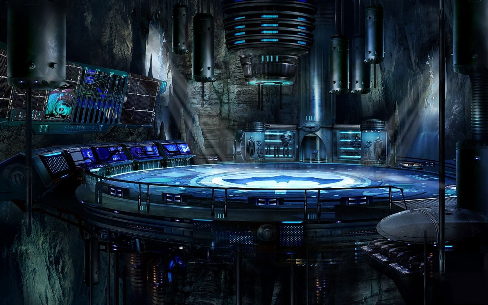 High-tech Batcave command center with glowing blue interfaces, central bat-symbol platform, and advanced surveillance equipment in a cavernous setting.