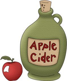 Green ceramic jug labeled "Apple Cider" beside a red apple with a bite taken out.