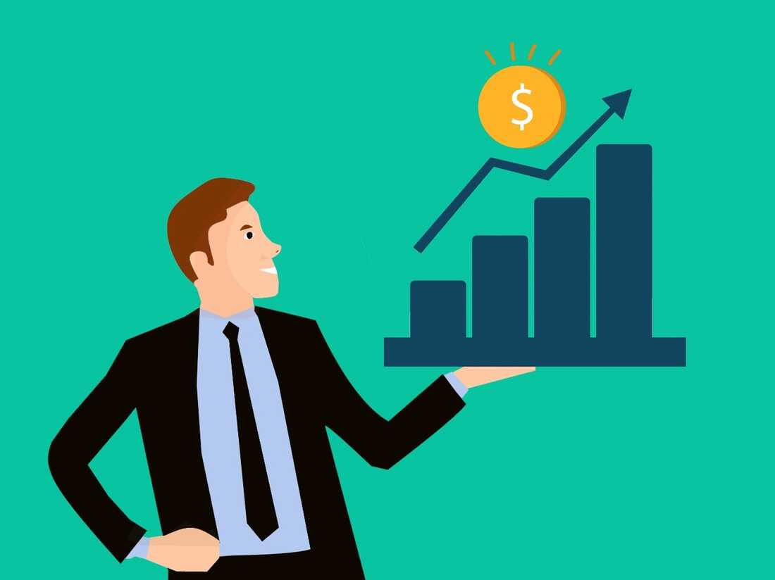 Businessman presenting a rising bar chart with a glowing dollar coin and upward arrow, symbolizing financial growth.