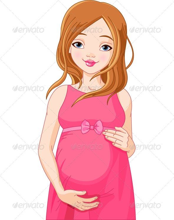 Smiling pregnant woman with long brown hair wearing a pink dress and holding her belly.