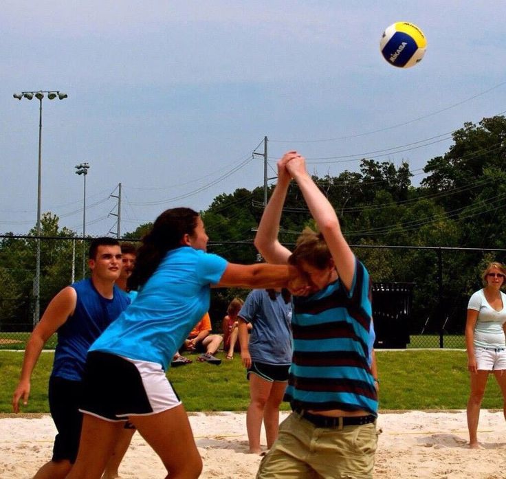 Beach Volleyball Action Shot - Dynamic Play on Sand Court