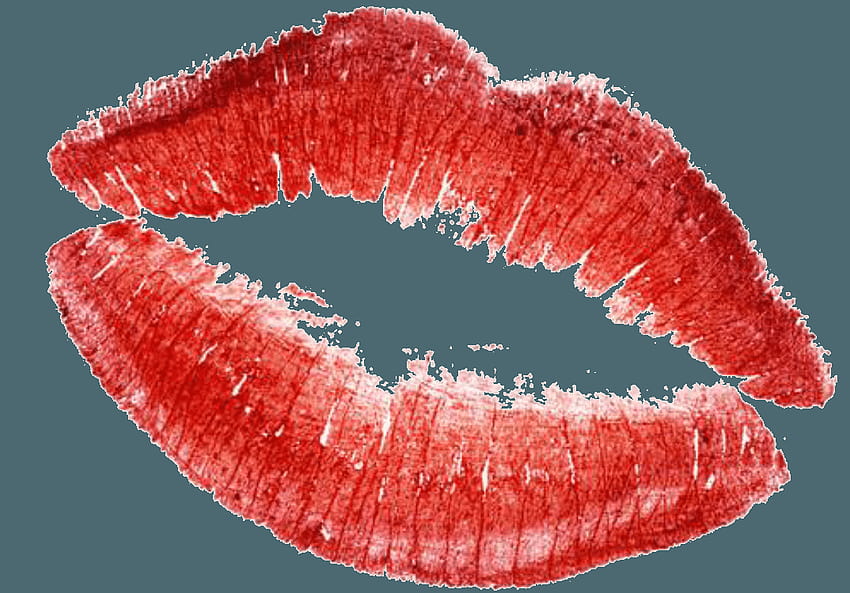 Vivid red lipstick kiss mark on teal background, textured and slightly smudged for realism.