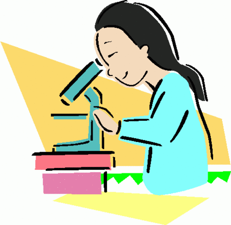 A smiling scientist with long dark hair uses a microscope on a lab bench, wearing a light blue lab coat.