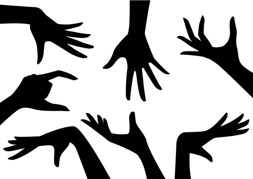 Black silhouettes of multiple hands reaching toward the center on a white background, symbolizing unity, help, or collaboration.