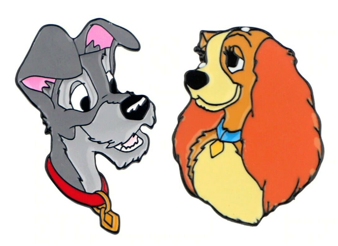 Disney’s Lady and the Tramp pin set: gray mutt with red collar and elegant cocker spaniel with blue bow, smiling face-to-face.