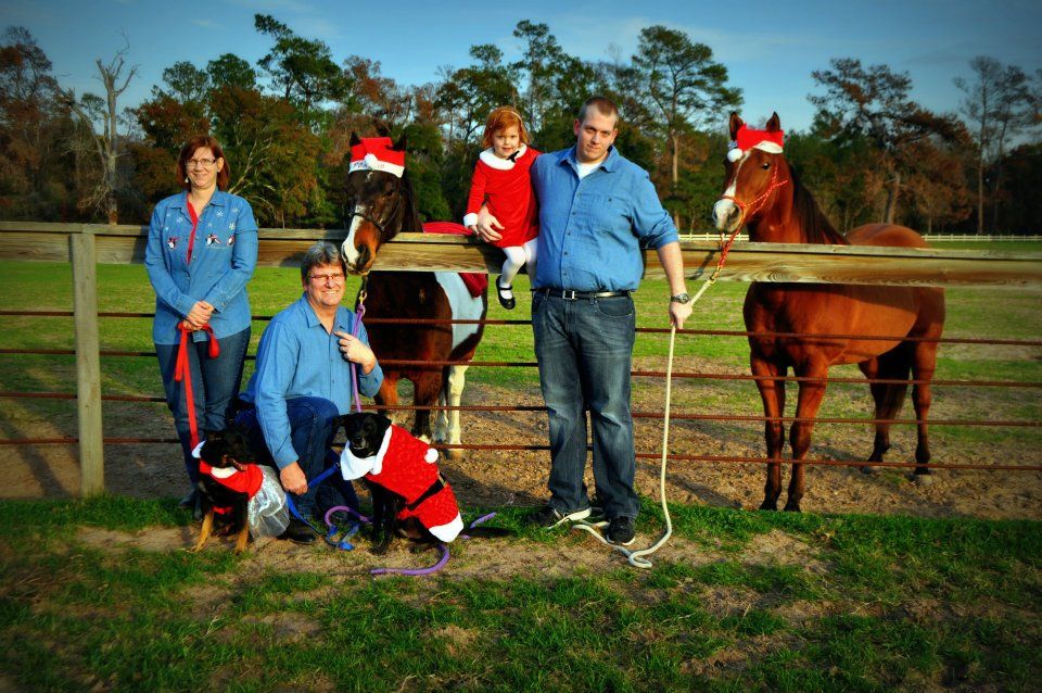 Festive Family Portrait with Horses and Dogs at Christmas Farm