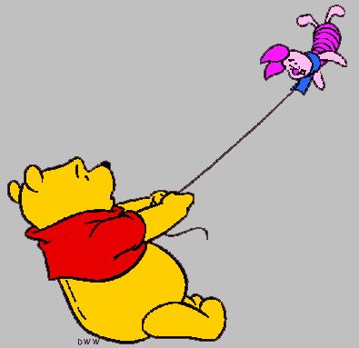 Winnie the Pooh flying a pink Piglet-shaped kite while sitting on the ground.