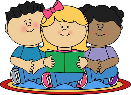 Three diverse children sitting together reading a green book on a colorful rug.
