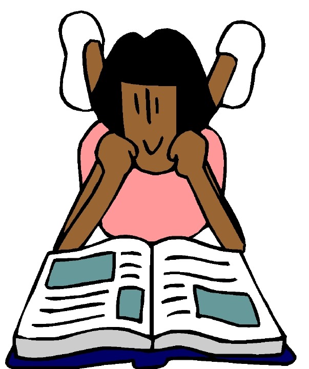 A smiling child with dark skin and hair lies on their stomach, propped up on elbows, reading an open book with blue illustrations.