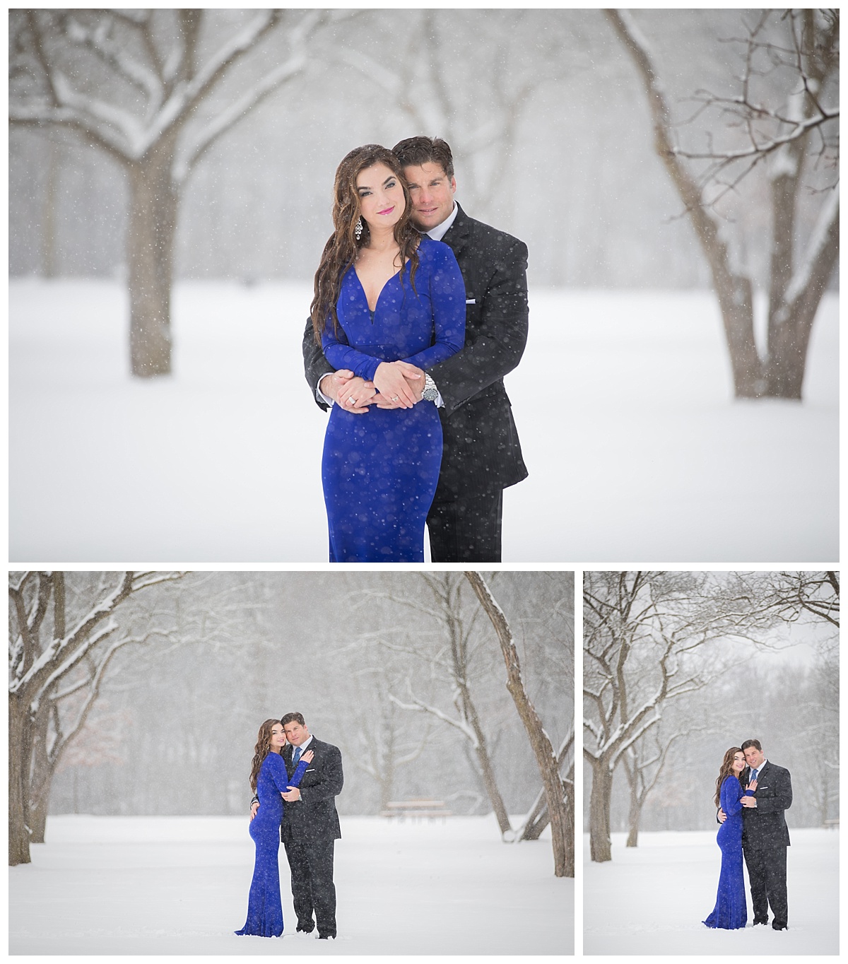 A couple embraces in a snowy park; woman in royal blue gown, man in black suit, snow falling softly around bare trees.