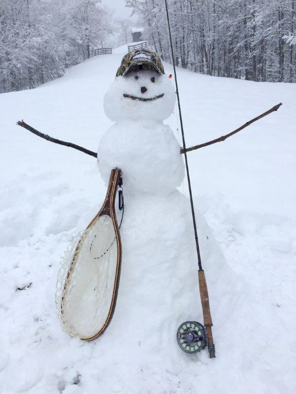 Fishing-Themed Snowman in Winter Woods - Whimsical Outdoor Art