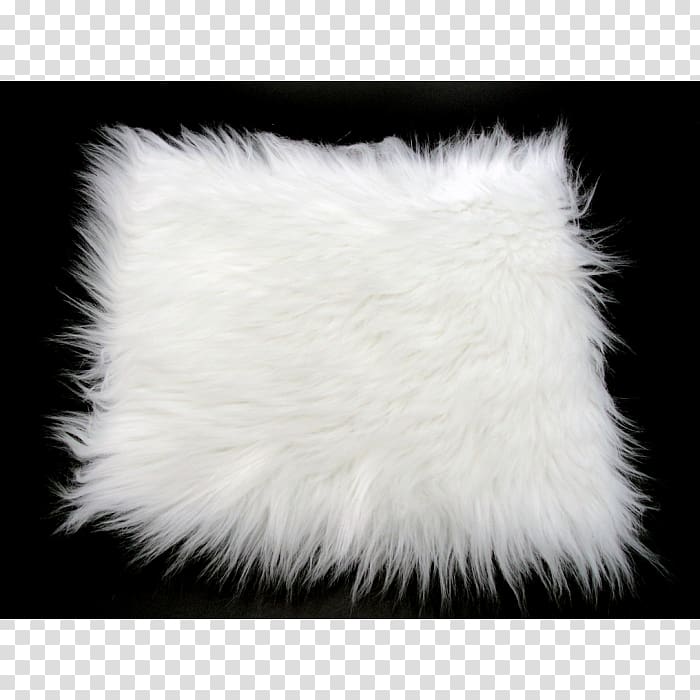 White fluffy faux fur pillow on black background, soft texture and plush appearance.