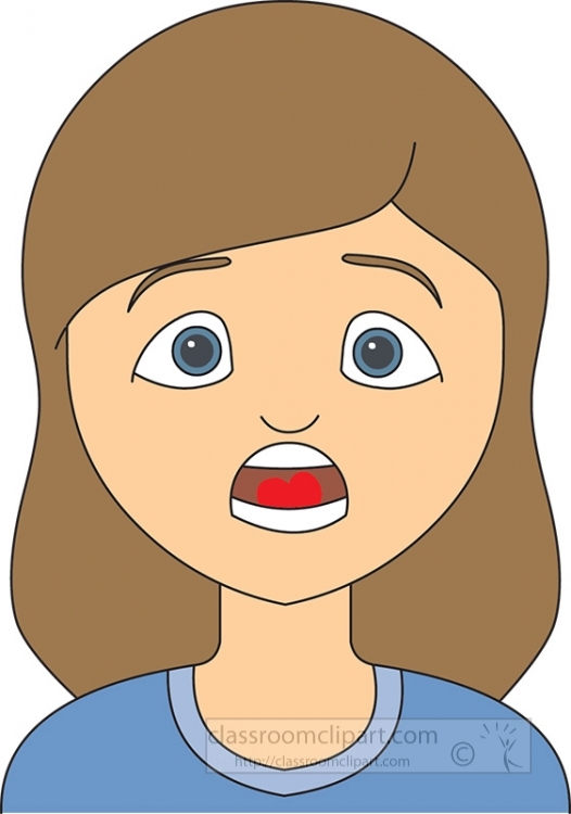 Surprised young girl with wide blue eyes and open mouth showing a red heart-shaped object inside.