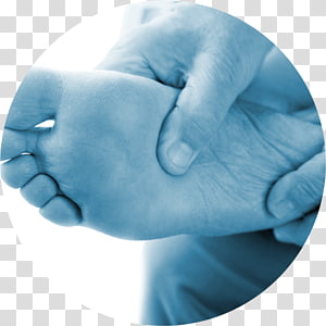 A therapist's hands gently massaging the sole of a foot in a clinical blue-toned image.