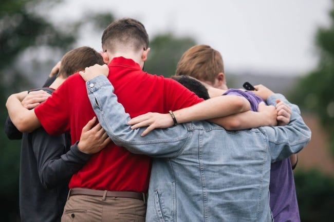 Unity and Support Among Friends - Capturing Brotherhood in Action