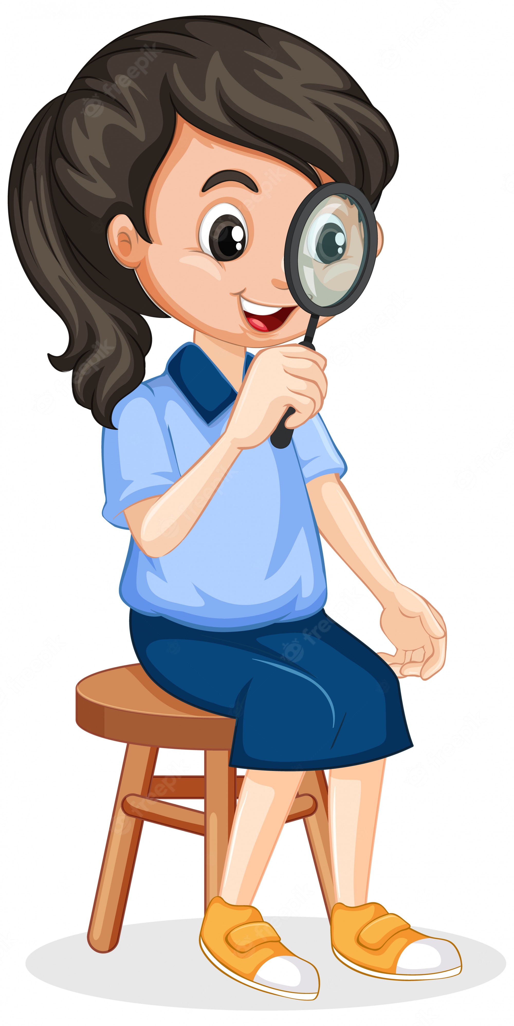 A smiling girl with dark hair in a ponytail sits on a stool, holding a magnifying glass to her eye while wearing a blue shirt and skirt.