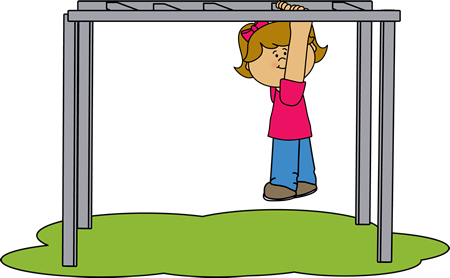 A young girl with blonde hair and a pink shirt hangs from monkey bars on a playground.