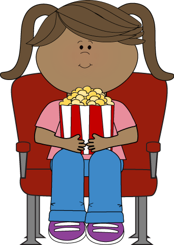 A young girl with pigtails sits in a red cinema chair holding a large striped popcorn bucket.
