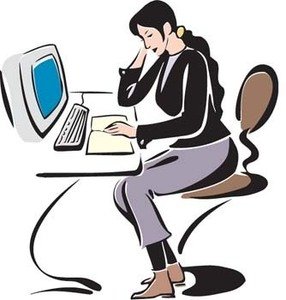 Woman sitting at desk, stressed while working on an old-style computer with documents and keyboard.