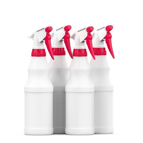 Four white spray bottles with red triggers arranged in a row on white background.