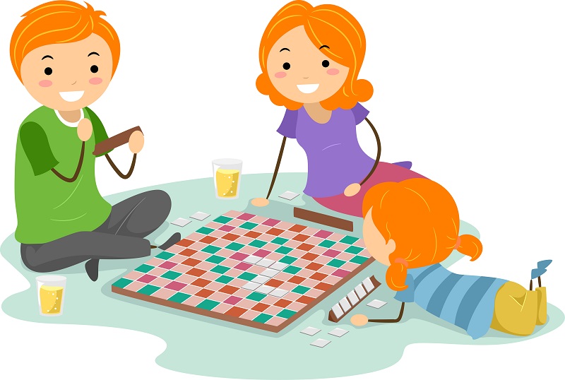 A smiling family of three playing a colorful board game on the floor with drinks nearby.