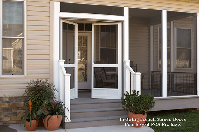 White in-swing French screen doors on a beige home porch with potted plants and stone accents.