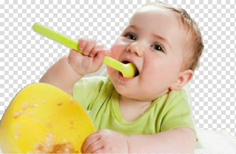 Baby in green shirt self-feeding with yellow spoon and bowl, joyful expression, transparent background.