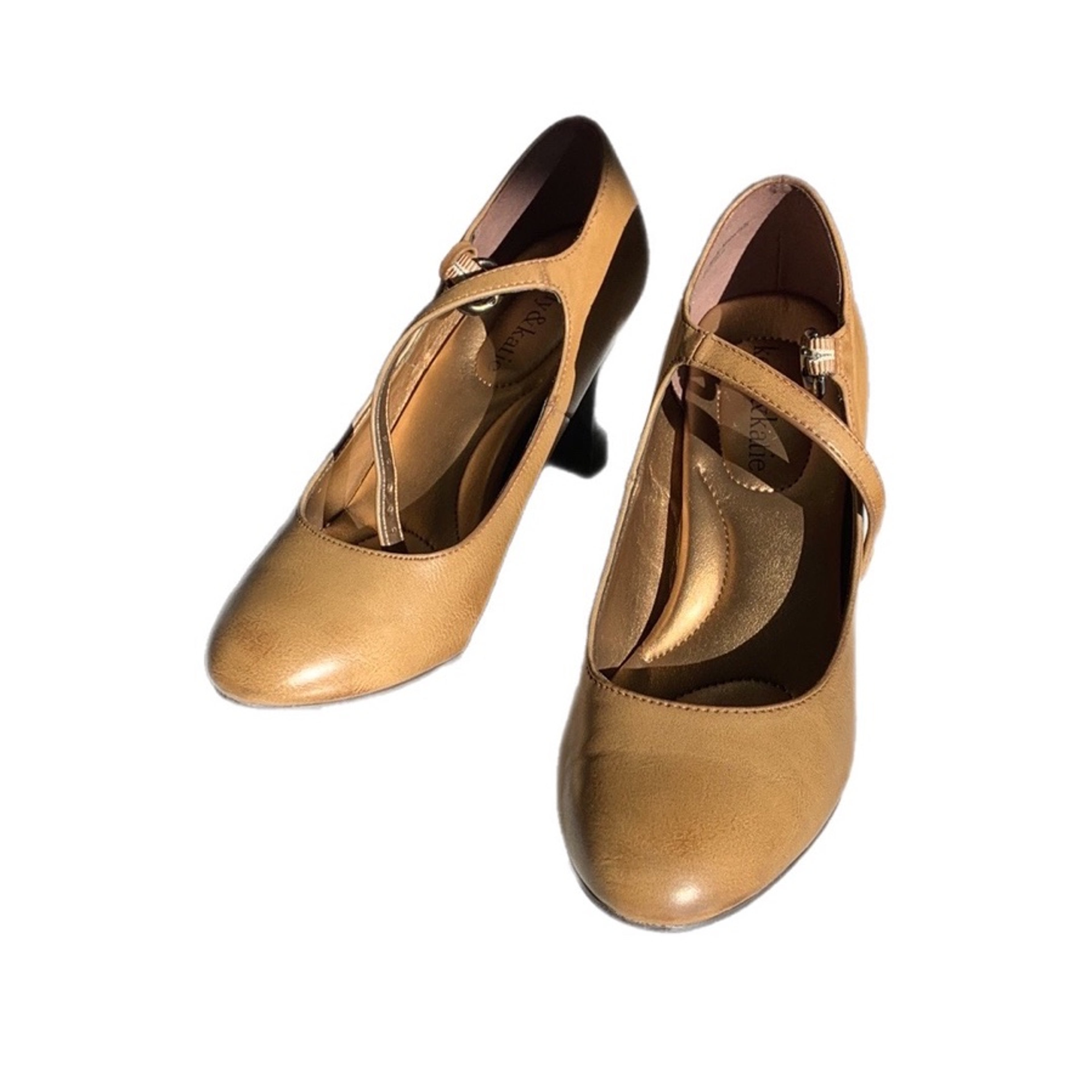Tan leather Mary Jane dance shoes with ankle strap and low heel, brand "Katie & Katie" visible inside.