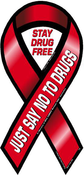 Red awareness ribbon with "Stay Drug Free" and "Just Say No to Drugs" text promoting anti-drug messaging.