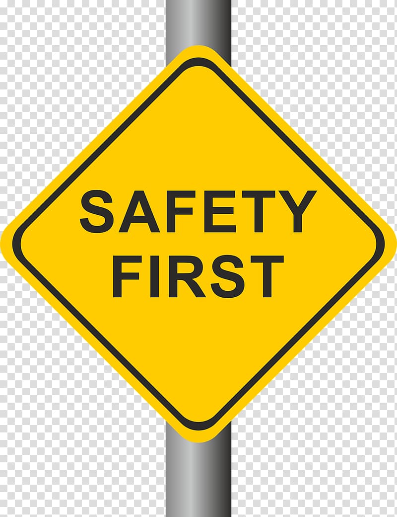 Yellow diamond-shaped sign with black border reading "SAFETY FIRST" mounted on a gray pole.