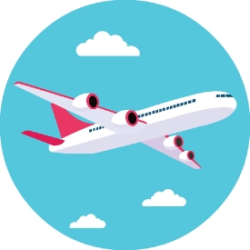 White passenger airplane with red accents flying through a blue sky with clouds.