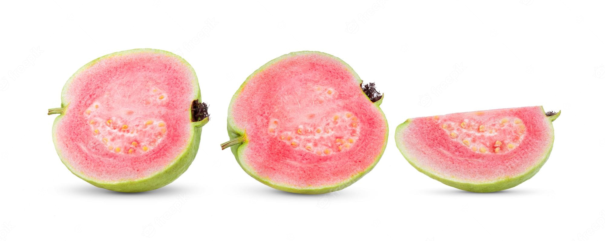Three fresh pink guava slices-halved and quartered-showing vibrant flesh, seeds, and green rind against a white background.
