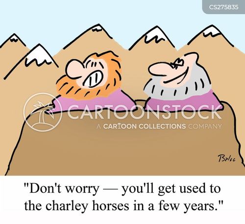 Two cartoon cavemen in fur hats sit on a cliff, one reassuring the other about charley horses.
