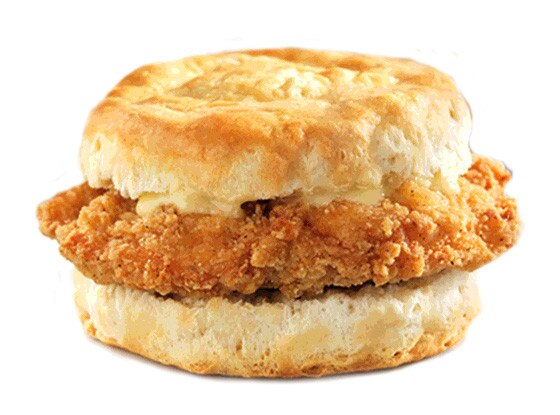 Crispy fried chicken sandwich served between a golden biscuit with melted cheese.