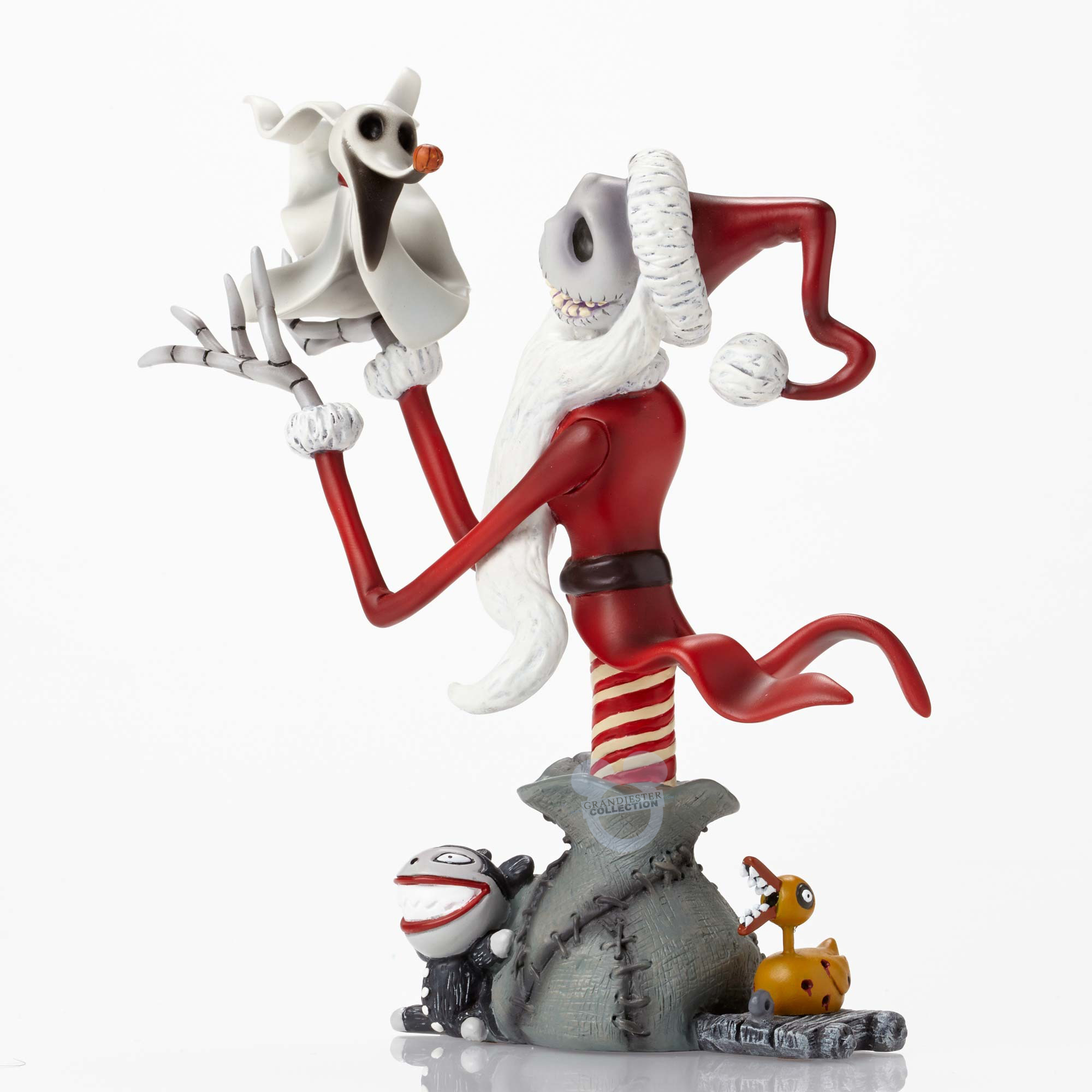 Jack Skellington as Santa Claus holding Zero, with Lock, Shock, and Barrel at base - Grandiester Collection figurine.