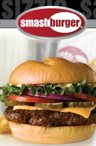 Smashburger classic burger with beef patty, cheese, lettuce, tomato, onion, pickles, and sesame bun.