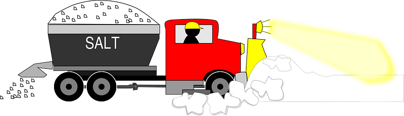 Red snowplow truck spreading salt on a snowy road, with a driver in a yellow hat and visible salt hopper labeled "SALT".