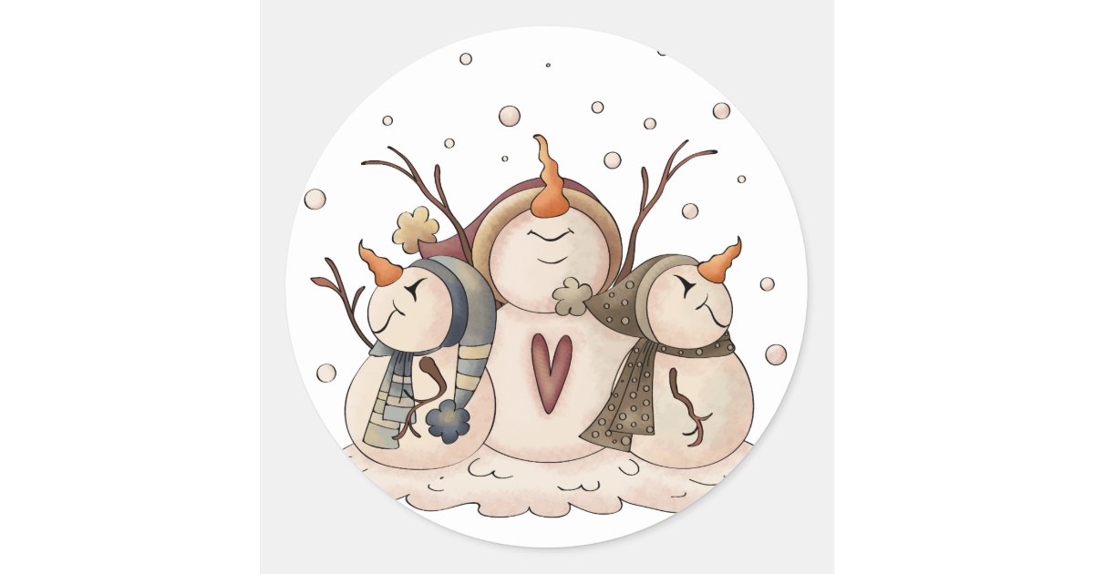 Three whimsical snowmen with carrot noses, scarves, and twig arms huddled together in falling snow, one with a heart on its chest.