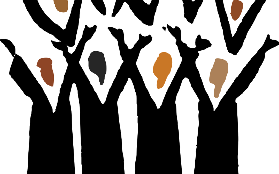 Silhouetted figures with raised arms and diverse skin-tone faces, symbolizing unity, celebration, or protest.