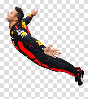 Formula 1 driver in Red Bull racing suit mid-air with arms outstretched, celebrating victory or exuberance.