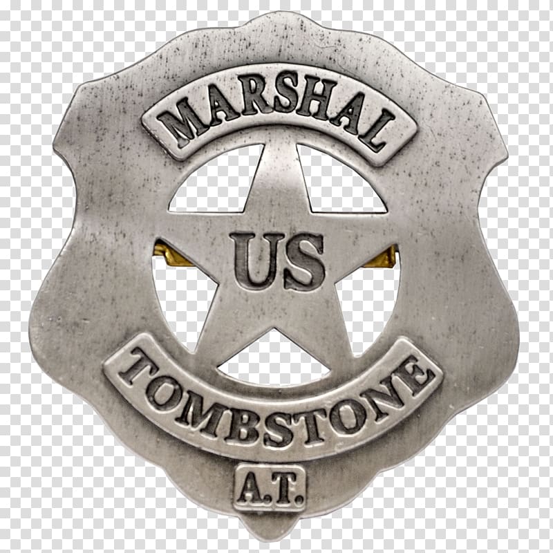 U.S. Marshal Tombstone A.T. badge with star emblem and engraved text on metallic shield-shaped badge.