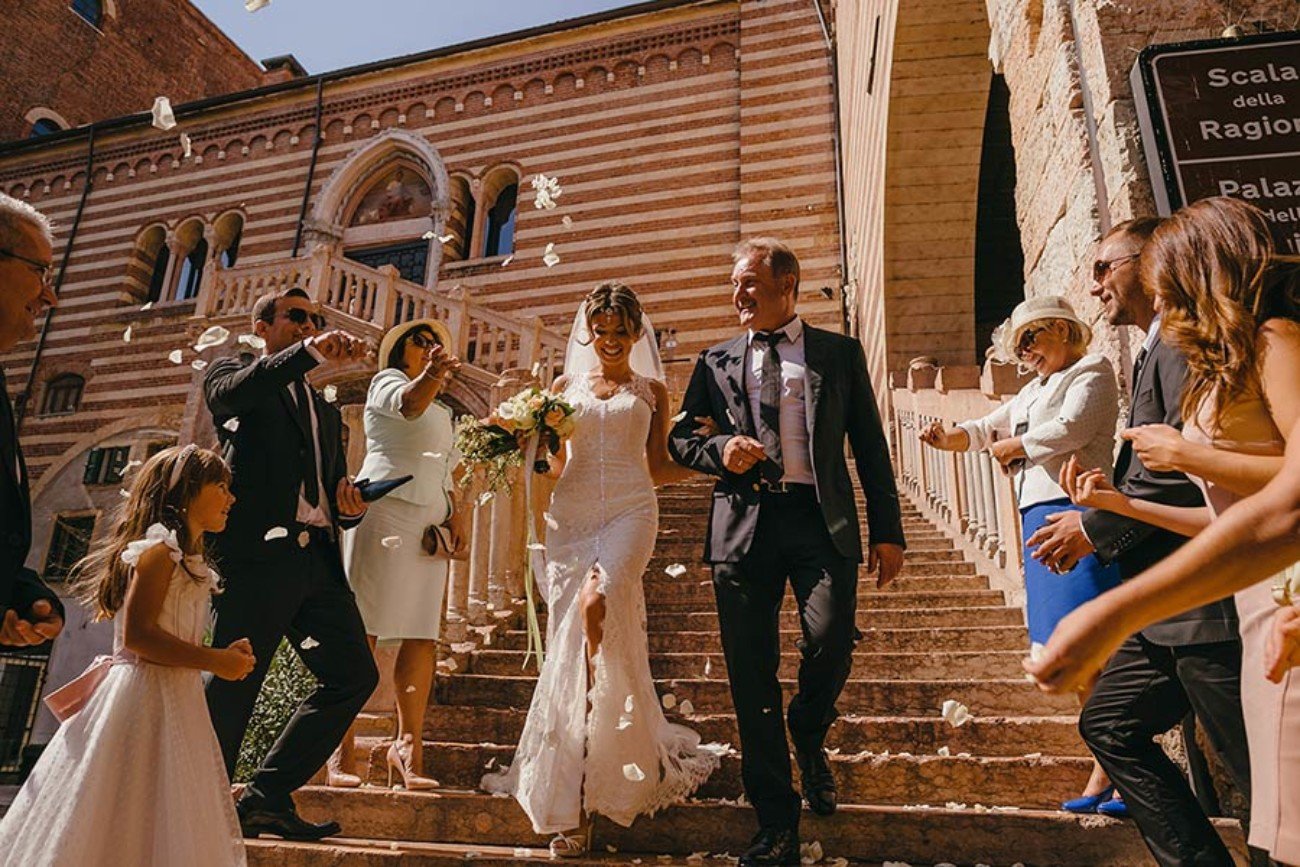 Italian Wedding Celebration on Historic Steps - Joyful Confetti Moment