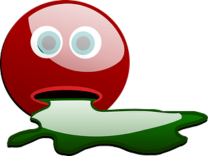 Red cartoon character with wide eyes vomiting green liquid on green background.