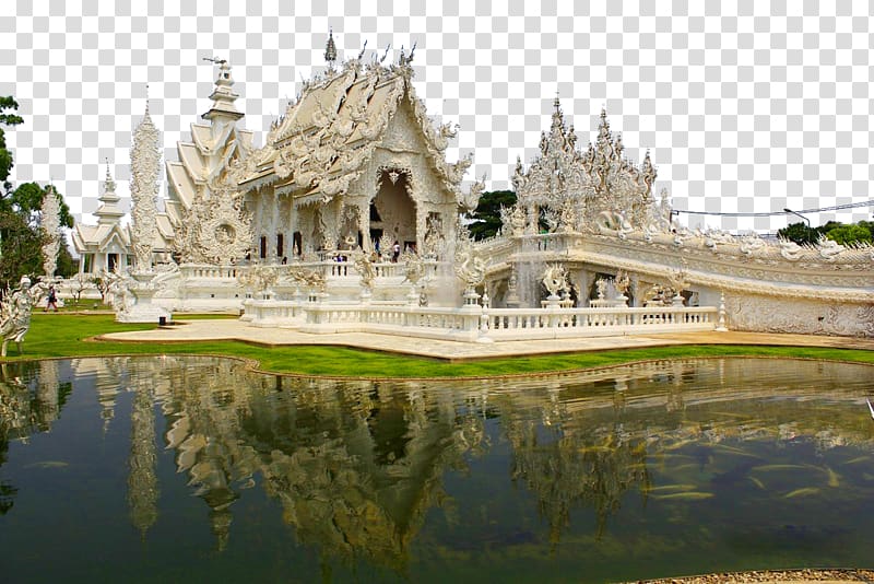 Wat Rong Khun, the striking white temple in Chiang Rai, Thailand, reflected in a serene pond with intricate Lanna-style architecture.