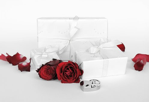 Elegant White Gift Boxes with Red Roses - Romantic Gift Presentation