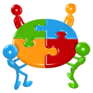 Four colorful stick figures collaboratively assembling a circular four-piece puzzle.